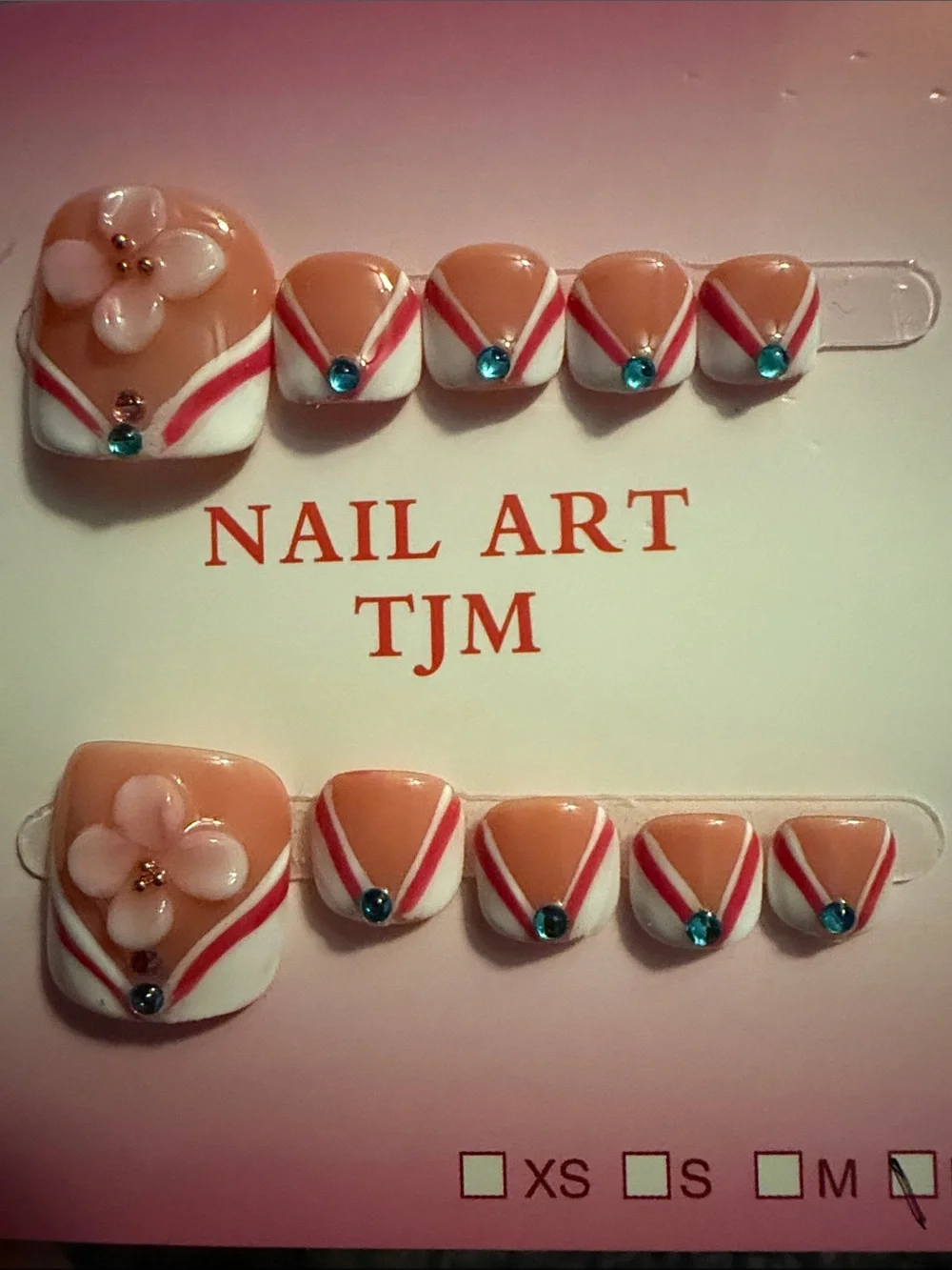 Handmade Nude Pink Flower Toe Nail Set with Blue Gems